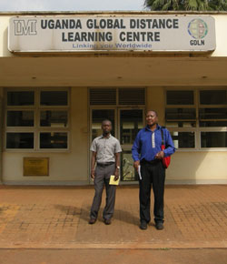 Abbey and Ssebunya by the learning center